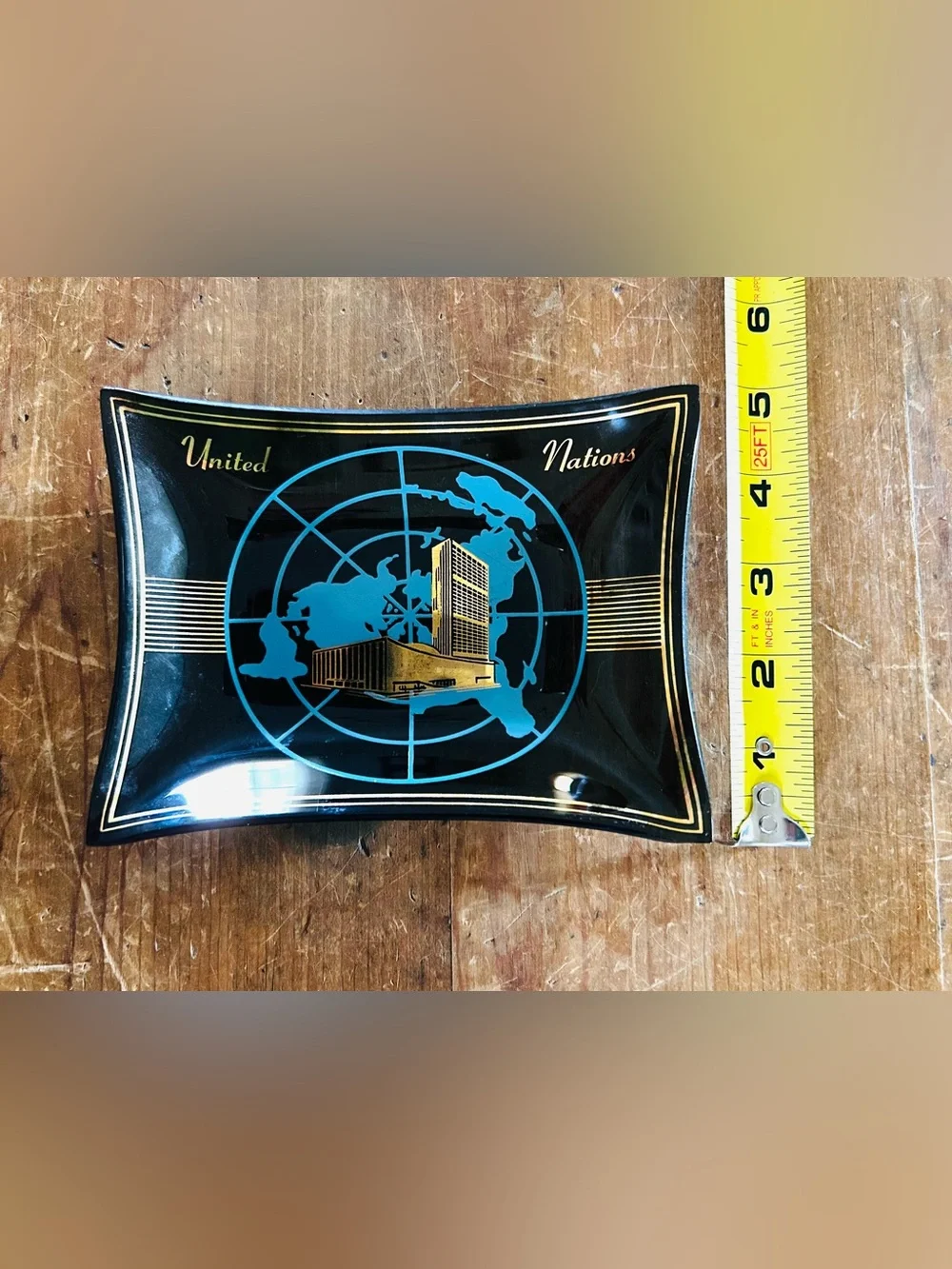 Vintage United Nations HQ NYC commemorative glass ashtray.
